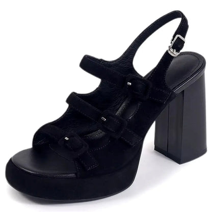 Black platform sandal with block heel on a white background