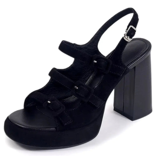 Black platform sandal with block heel on a white background