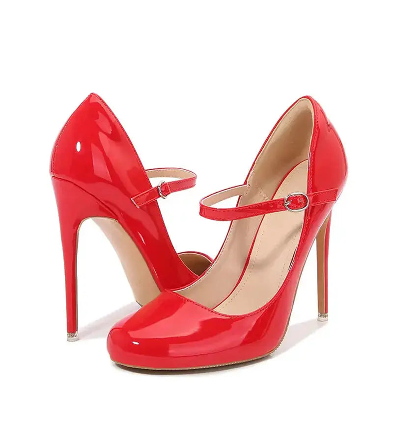 Red high-heeled shoes with a strap on a white background